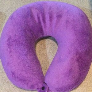Purple travel neck pillow.
